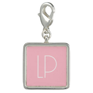 Elegant minimalist modern initial on pastel pink charm