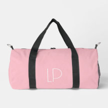 Elegant minimalist modern initial on pastel pink
