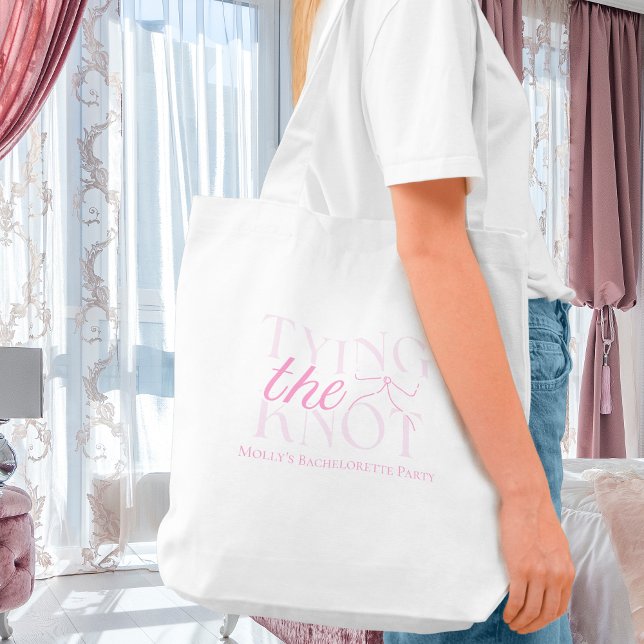 Elegant Minimalist She's Tying the Knot Bow Bridal Tote Bag (Tying the Knot tote bag with modern font – perfect for bridesmaid proposals or bridal celebrations!)