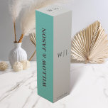Elegant minimalist wedding wine box<br><div class="desc">Elevate your wedding celebration with our elegant and minimalist wine boxes. Designed to seamlessly match your Elegant minimalist wedding suite, these boxes feature an almost white-gray background with the couple’s initials prominently displayed, along with their names and date elegantly placed with accents of Teal. Perfect for adding a personalized touch...</div>