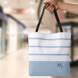 Elegant Modern Bold Stripes Monogram Initials Blue Tote Bag<br><div class="desc">Elegant contemporary design features a mix of thick bands and thin stripes in crisp white and modern ice blue.  Add two or three monogrammed initials in stylish black script. Design repeats on back.  Custom color requests accepted.</div>