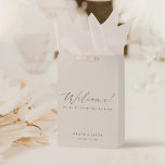 Elegant Modern Ivory Wedding Welcome Gift Bags<br><div class="desc">This minimalist gift bags decorated with romantic and elegant typography. Add elegance - you can change handles to satin ribbon and add guests name tags. To change names, date and welcome text , click «Personalize». Attention! When resizing, you need to change the position of the lower elements. To move the...</div>