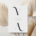 Elegant Modern Minimalist Black and White Wedding Invitation<br><div class="desc">Modern Minimalist Black and White Wedding Invitation. Features elegant monogram typography and minimal graphic design. Personalize text with all the details of your special day.</div>