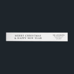 Elegant Modern Newspaper Merry Christmas Wrap Around Label<br><div class="desc">Create an elegant and modern wrap-around label inspired by a classic newspaper design, perfect for adding a sophisticated touch to your Merry Christmas greeting. The label features sleek black and white elements with minimalist typography, mimicking the look of a traditional newspaper headline. The text highlights a bold 'Merry Christmas' message,...</div>