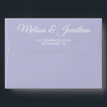 Elegant modern Purple white script wedding Envelope<br><div class="desc">Create to match our "Delicate Orchids - Periwinkle purple wedding suite", this envelope features the bride and groom's names and return address in a romantic and elegant white script over a light purple background. The inside of the envelope features a periwinkle purple color. These envelopes can also be used for...</div>