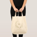 Elegant Monogram Boho Wildflower Wreath Bridesmaid Tote Bag<br><div class="desc">Monogrammed initial framed by elegant delicate watercolor wildflower design, pastel palettes of soft yellow, off white, sage green, dusty rose, blush pink, burgundy, and botanical greenery, with personalized name, simple and romantic. Great monogrammed gift for bridesmaid at modern rustic party, boho country garden wedding party in spring and summer. See...</div>