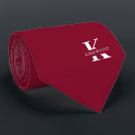 Elegant Monogram Bright Burgundy | White Neck Tie<br><div class="desc">An elegant necktie featuring a bold white monogram across a bright burgundy background. Atop this monogram sits your first or last name spelled out in all capitals. If you prefer a bolder look for the personal name inside of the large letter you can do the following: Use the customize/ edit...</div>