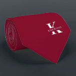 Elegant Monogram Bright Burgundy | White Neck Tie<br><div class="desc">An elegant necktie featuring a bold white monogram across a bright burgundy background. Atop this monogram sits your first or last name spelled out in all capitals. If you prefer a bolder look for the personal name inside of the large letter you can do the following: Use the customize/ edit...</div>