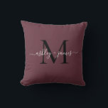 Elegant Monogram Burgundy Script Names Wedding Throw Pillow<br><div class="desc">Chic monogrammed keepsake pillow with your names and monogram in white elegant handwritten script calligraphy and black modern typography on a burgundy background. Simply add your names and monogram. Exclusively designed for you by Happy Dolphin Studio. If you need any help or matching products, please contact us at happydolphinstudio@outlook.com. We're...</div>