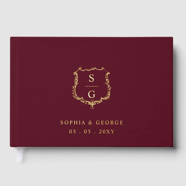 Elegant Monogram Crest Burgundy and Gold Wedding Foil Guest Book (Front)