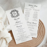 Elegant Monogram Crest Wedding Ceremony Program<br><div class="desc">This elegant black and white wedding program features an ornate crest at the top with the monogram initials of the bride and groom in fancy formal script font.</div>