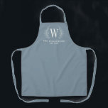 Elegant Monogram Dusty Blue Family Name Apron<br><div class="desc">This dusty blue and white apronr is decorated with a laurel leaf monogram and your name and wedding date. Great for wedding and anniversary gifts.  Personalize it with your Initial,  name and wedding date. Comes in a variety of colors. Designed for you by blackberry Boulevard.</div>