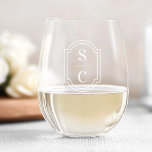 Elegant monogram emblem etched stemless wine glass<br><div class="desc">Stemless wine glasses with the bride's and groom's monogram surrounded by an elegant frame.</div>