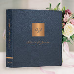 Elegant monogram gold navy script wedding album 3 ring binder<br><div class="desc">Luxury exclusive looking monogrammed scrapbook wedding album binder featuring a faux gold copper metallic square over a stylish dark navy blue faux leather background.</div>