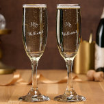 Elegant Mr Mrs Newlyweds Couple Honeymoon Wedding Champagne Flute<br><div class="desc">Create your own custom, heart, elegant calligraphy typography script font, modern cool chic stylish classy, high quality, durable glass, sturdy, elegant design, beautiful laser engraved etched glassware 16 oz wedding / honeymoon Mr & Mrs bride groom newlywed husband wife couple set of 2 champagne flute glass perfect for champagne, mimosas,...</div>