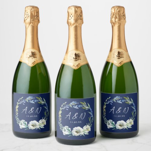 Elegant Navy Blue Floral Winter Wedding Monogram Sparkling Wine Label