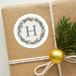 Elegant Neutral Greenery Pine Wreath Holiday Classic Round Sticker<br><div class="desc">Rustic modern holiday stickers feature a watercolor painted laurel watercolor greenery wreath with bits of pine,  berries,  and pinecones. Neutral color scheme includes green,  white gold metallic,  tan,  brown,  off white,  and crisp white colors. Personalize with your custom monogram initial.</div>