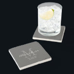 Elegant Newlyweds Established Monogram Name Grey Stone Coaster<br><div class="desc">Give a perfect keepsake with this Elegant Newlyweds Established Monogram Name Grey Stone Coaster. It is a modern customizable design in dark grey, white and light grey. Bride and groom's first names are on the center in modern white handwriting script lettering and initial of new last name is in grey....</div>