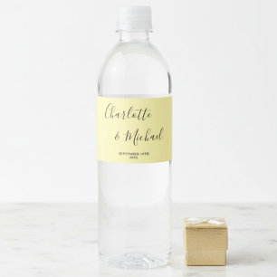 Elegant Pale Yellow Script Minimalist Wedding Water Bottle Label