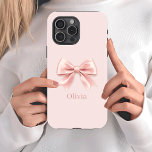 Elegant Pastel Pink Bow & Name Personalized iPhone 15 Pro Case<br><div class="desc">Protect your phone in style with this elegant pastel pink phone case featuring a delicate bow design and your personalized name. Combining fashion and functionality, this case offers durable protection while adding a feminine and sophisticated touch to your device. Perfect for everyday use, it makes a thoughtful gift for birthdays,...</div>
