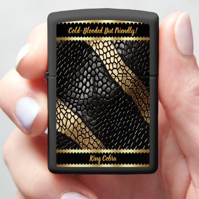 Elegant patterns of a black and gold snake skin zippo lighter (In Hand)