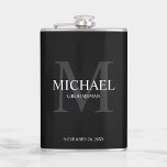 Elegant Personalized Groomsmen Monogram and Name Flask<br><div class="desc">Add a personal touch to your wedding with personalized groomsmen flask.
This flask features personalized groomsman's name with title and wedding date in white and monogram in light grey as background,  in classic serif font style,  on black background.

Also perfect for best man,  father of the bride and more.</div>