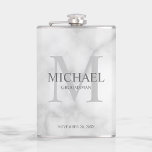 Elegant Personalized Groomsmen Monogram and Name Flask<br><div class="desc">Add a personal touch to your wedding with personalized groomsmen flask. This flask features personalized groomsman's name with title and wedding date in grey and monogram in light grey as background, in classic serif font style, on white marble background. Also perfect for best man, father of the bride and more....</div>