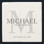 Elegant Personalized Groomsmen Stone Coaster<br><div class="desc">Add a personal touch to your wedding with personalized groomsmen stone coaster.
This coaster features personalized groomsman's name with title and wedding date in grey and monogram in light grey as background,  in classic serif font style.

Also perfect for best man,  father of the bride,  ring bearer and more.</div>