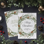 Elegant Pine Wreath and Greenery | Merry Christmas Holiday Card<br><div class="desc">This stunning holiday card features a Christmas wreath with elegant botanical greenery foliage, and pine cones with festive white flowers. Modern script calligraphy says "Merry Christmas, " and a subtle, sage green watercolor splash decorates the center of the wreath. The back has a matching design with room to add a...</div>