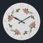 Elegant Pink Vintage Rose Large Clock<br><div class="desc">This pretty decorative wall clock has a vintage pink rose design. A full blown pink rose, accented with rose buds and golden wheat heads, on a delicate vine with green and gold leaves. This motif is repeated four times around the face of the clock. The numbers are in rose pink....</div>