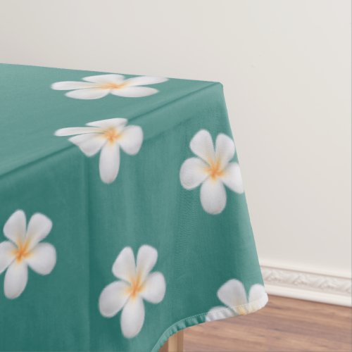 Elegant Plumeria Flowers on Teal Tablecloth