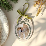 Elegant Polka Dot Christmas Bow Photo Keepsake Ceramic Ornament<br><div class="desc">Celebrate the magic of the holiday season with our elegant polka dot Christmas bow photo keepsake ceramic ornament. This beautifully crafted ornament is designed to capture your most cherished memories with elegance and grace. Features a charming polka dot bow with gracefully draping ribbon tails, complemented by scattered polka dots that...</div>