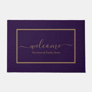 Elegant purple and gold script family name welcome doormat