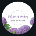 Elegant Purple Hydrangea Wedding Classic Round Sticker<br><div class="desc">This elegant floral design features purple hydrangeas. The beautiful purple hydrangeas are complimented with their greenery. The bride's and groom's names are color matched to the purple of the hydrangea flower and are encircled with three geometric rings. This is the perfect elegant floral wedding design ideal for any wedding theme....</div>