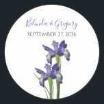 Elegant Purple Iris Wedding Classic Round Sticker<br><div class="desc">This elegant floral design features purple irises. The beautiful purple irises with their green stems. The bride's and groom's names are color matched to the purple of the iris flower. This is the perfect elegant floral wedding design ideal for any wedding theme. Elegant iris flower wedding sticker design with modern...</div>