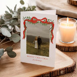 Elegant Red Bow with Greenery Photo Christmas Holiday Card<br><div class="desc">Elegant Red Bow with Greenery Photo Christmas Holiday Card. Click the personalize/edit with design tool button to customize this design with your personal details.</div>