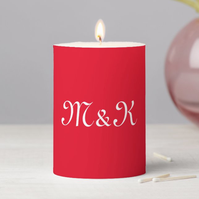 Elegant red script custom couple initials monogram pillar candle (In Situ)