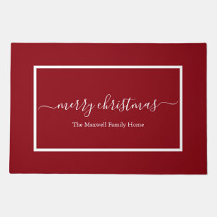 Elegant red script family name merry christmas doormat