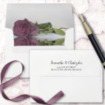Elegant Reflecting Dusty Mauve Pink Rose Wedding Envelope<br><div class="desc">These beautiful wedding envelopes are perfect for making your invitations all the more special. They feature a romantic design on the inside flap with a single long-stemmed dusty rose or mauve pink colored rose reflecting with waves and ripples. The back flap has your return address in lacy script calligraphy. Sophisticated...</div>