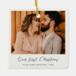 Elegant romantic Our First Christmas photo Ceramic Ornament<br><div class="desc">An elegant romantic calligraphy and a modern design for this photo ornament gift. To customize with your favorite couple picture. You can also easily change the color of the font to your liking. Perfect to celebrate your First Christmas as newlyweds or as a couple.</div>