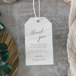 Elegant Rose Gold Calligraphy Thank You Welcome Gift Tags<br><div class="desc">These elegant rose gold calligraphy thank you welcome gift tags are perfect for a simple wedding. The blush pink design features a minimalist sign decorated with romantic and whimsical faux rose gold foil typography. Personalize the tags with the location of your wedding, a short welcome note, your names, and wedding...</div>