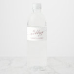 Elegant Rose Gold Calligraphy Wedding Water Bottle Label<br><div class="desc">These elegant rose gold calligraphy wedding water bottle labels are perfect for a simple wedding. The blush pink design features a minimalist label decorated with romantic and whimsical faux rose gold foil typography. These labels add a beautiful detailed touch to your wedding reception, rehearsal dinner, engagement party, or wedding welcome...</div>