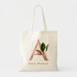Elegant Rose Gold Floral Monogram Bridal Party Tote Bag<br><div class="desc">The letter A - a beautiful monogram initial in rose gold embellished with an exquisite floral and geometric shape pattern.  Ideal gift and keepsake idea for your favorite bridesmaid.  Easily customize the name of choice.</div>