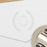 Elegant Round Laurel Branch Personalized Monogram Embosser<br><div class="desc">This simply elegant custom monogrammed embosser features a round floral wreath or crest design with leafy laurel branches that frames the couple's or family's last name monogram initial. Personalize with your letter.</div>