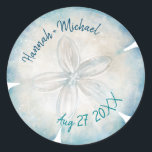 Elegant Sand Dollar Name Beach Wedding Classic Round Sticker<br><div class="desc">Create your own unique sand dollar beach wedding stickers to use on your guest favors/gifts, or as elegant envelope seals to accent your tropical invitations... The beautiful watercolor artwork created by Raphaela Wilson depicts a single sand dollar shell in popular nautical shades of deep ocean blue, light teal, and ivory...</div>