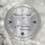Elegant Sapphire Diamonds 45th Wedding Anniversary Round Clock<br><div class="desc">Opulent elegance frames this 45th wedding anniversary design in a unique scalloped diamond design with center teardrop diamond with heart-shaped sapphire accents and faux added sparkles on a silver-tone gradient. Please note that all embellishments are printed and are only made to appear as real as possible in a flat, printed...</div>