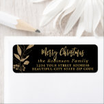 Elegant Script Black Gold Christmas Return Address Label<br><div class="desc">Modern Elegant Script Black and Gold Family Name Christmas Return Address Labels. Featuring a pretty hand-written calligraphy font script with saying "Merry Christmas",  faux gold foil botanical leaves on black background. Great for Christmas holiday season,  easy to personalize them with your names and return address info.</div>