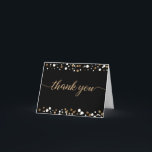 Elegant Script Black gold confetti 50th birthday Thank You Card<br><div class="desc">Express your heartfelt gratitude in style with this elegant and personalized 50th birthday thank you card. Designed with sophistication in mind, this folded card is the perfect way to thank your loved ones for making your milestone celebration truly unforgettable. The black background sets the stage for a touch of luxury,...</div>