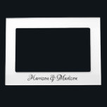 Elegant Script Custom Names Monogram Wedding Magnetic Frame<br><div class="desc">Elegant Script Custom Names Monogram Wedding Magnetic Frame.
Customizable phrase,  text,  date,  names.
Black and white</div>