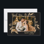 Elegant Script Gold Leaves Photo Thank You Card<br><div class="desc">Elegant, stylish, gold and black botanical photo wedding thank you card. Chic modern design template feature one single couple photo, faux gold foil botanical leaf branches frame with berries and a pretty hand lettering typography brush script „Thank You” text in gold on black background color. Personalize your name and thank...</div>